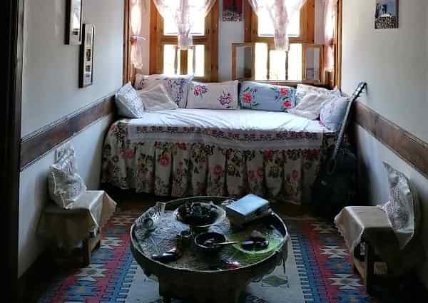 white and brown floral bed linen
